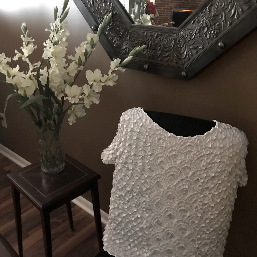 Unique white top graphically appealing to the eye
